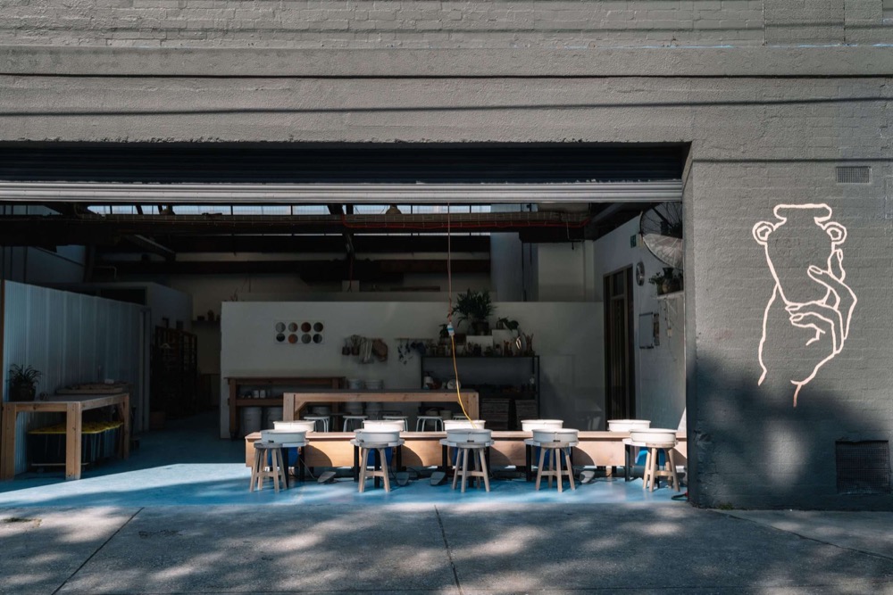 Open entrance and workspace at Bisque Studios